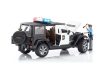 Bruder Jeep Wrangler Unlimited Rubicon Policajné vozidlo s bielou figúrkou (02526)